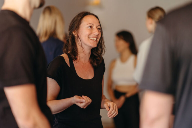 Client participating in a wellness workshop at OHA Wellness in Toronto, focusing on mindfulness and personal growth